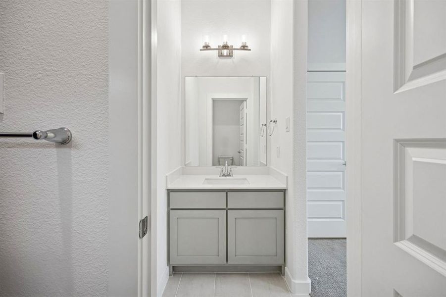 Bathroom in the Gilmour II home plan by Trophy Signature Homes – REPRESENTATIVE PHOTO Bathroom in the Gilmour II home plan by Trophy Signature Homes – REPRESENTATIVE PHOTO