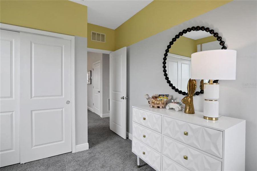 Furnished interior view inside a new home in Serenade at Ovation, Winter Garden (Image 15).