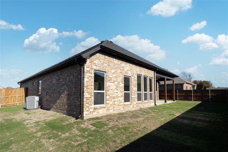 Exterior details and patio area of a home in , Mabank (Image 23).