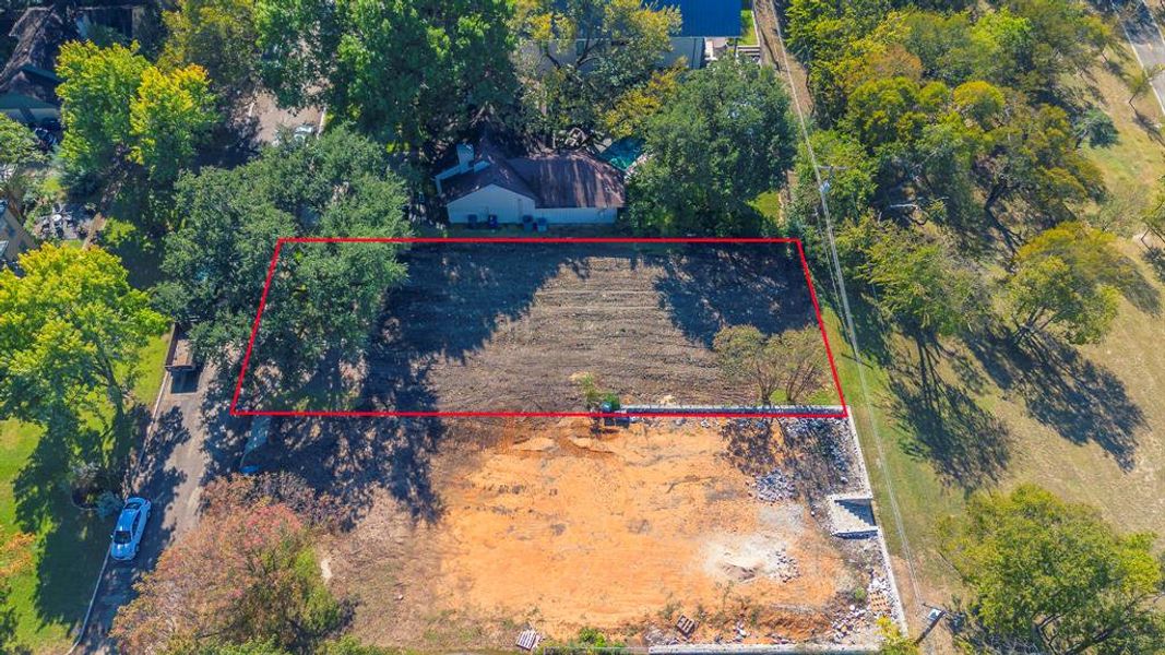 Aerial view of property and surrounding area with property parcel outlined Aerial view of property and surrounding area with property parcel outlined