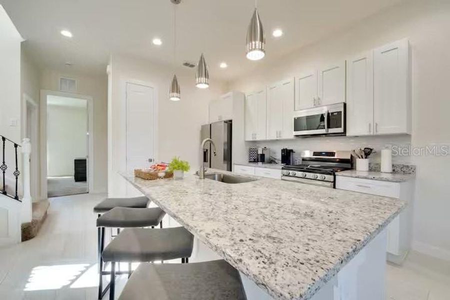 Furnished interior view inside a new home in , Kissimmee (Image 21). Furnished interior view inside a new home in , Kissimmee (Image 21).