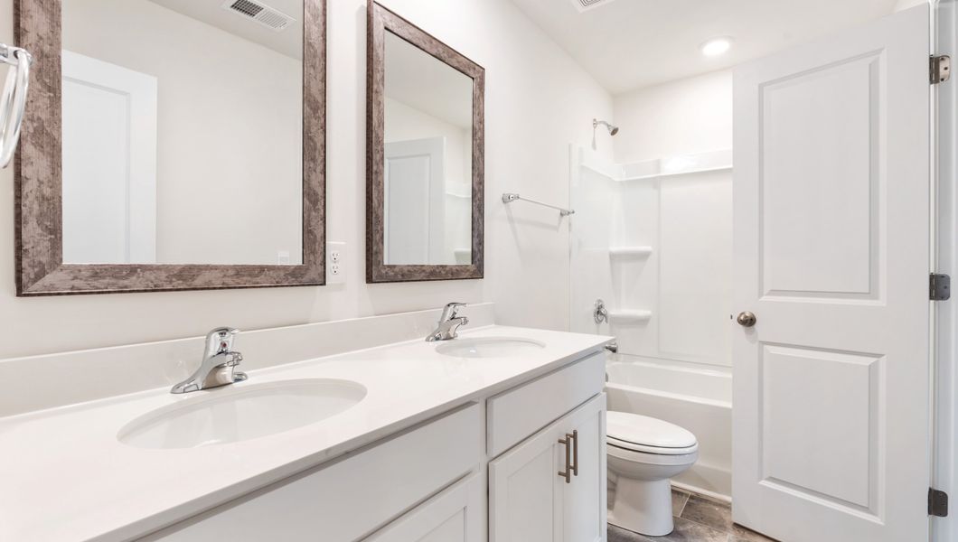 Furnished interior view inside a new home in Hunters Ridge, Woodruff (Image 12).