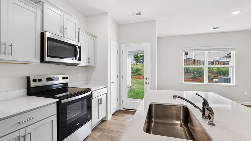 Furnished interior view inside a new home in Tanglewood Townes, Greenville (Image 11).