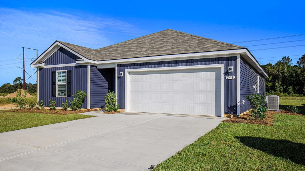 Front exterior of a new home in Sandridge Park, Little River, SC, highlighting curb appeal (Image 2).