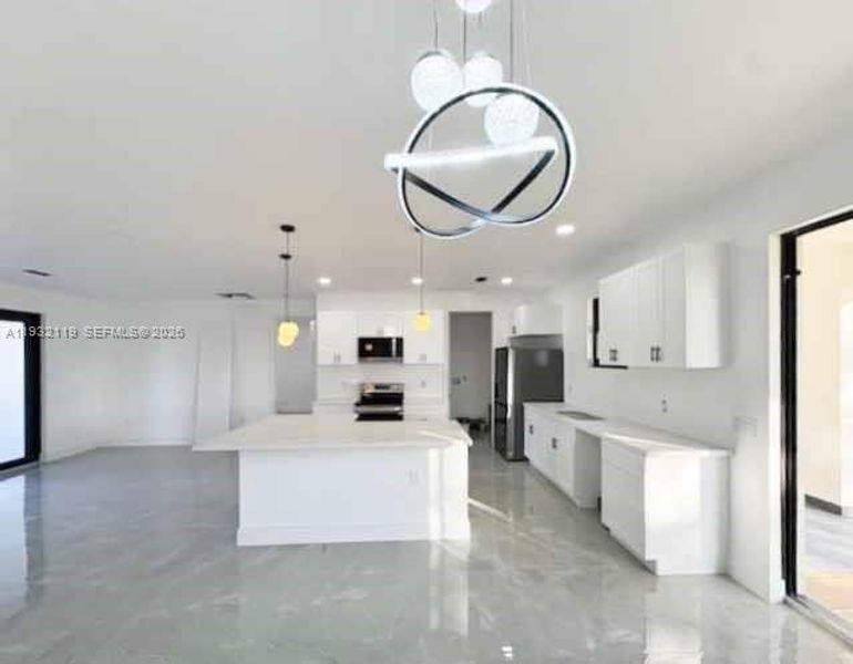 Furnished interior view inside a new home in , Clewiston (Image 13).