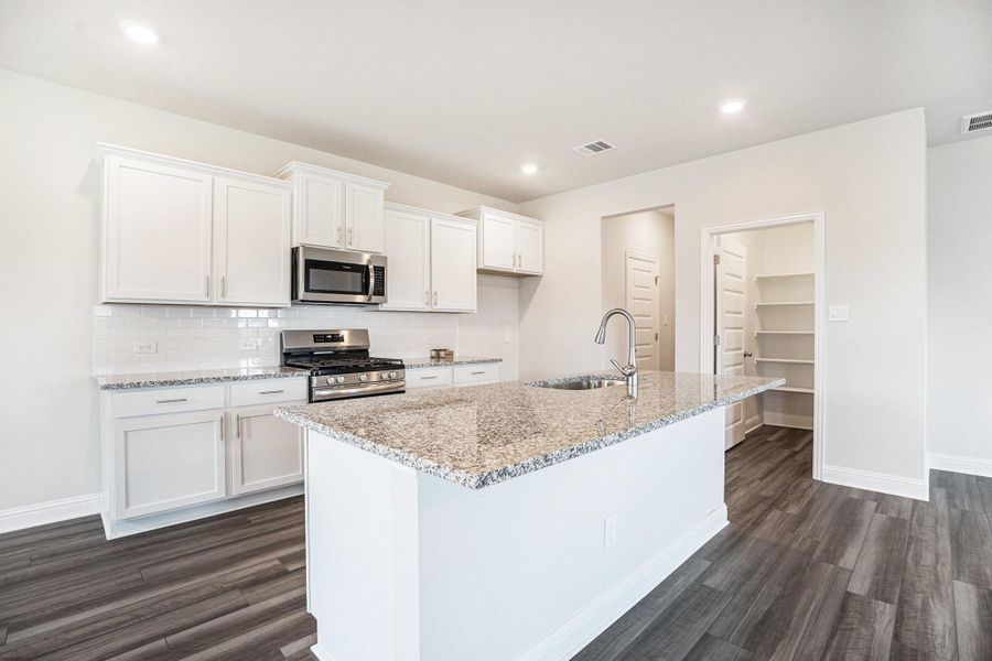 Furnished interior view inside a new home in Bayou Maison, Dickinson (Image 6).