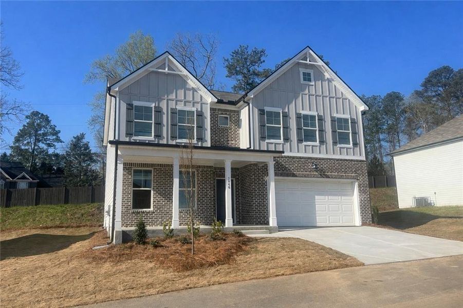 Front exterior of a new home in Stonegate, Atlanta, GA, highlighting curb appeal (Image 15).