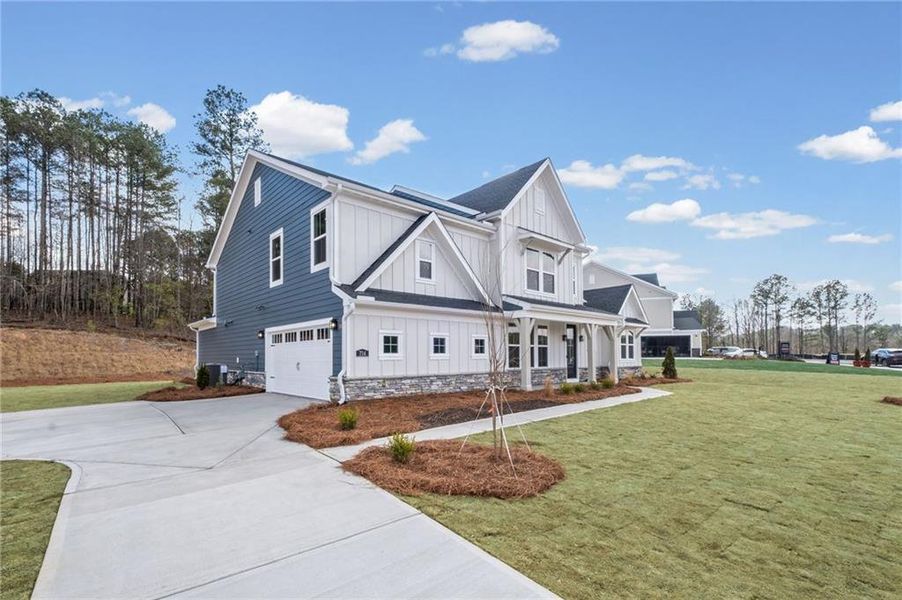 Front exterior of a new home in Governor’s Preserve, Canton, GA, highlighting curb appeal (Image 25).