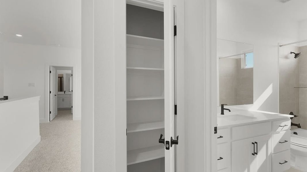 Representative furnished interior of a home built from the Cornell by Chesmar Homes in Crescent Bluff, Georgetown (Image 9).