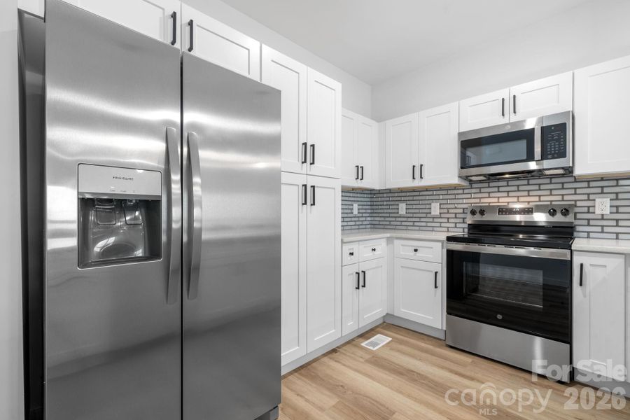 Furnished interior view inside a new home in , Hickory (Image 5).
