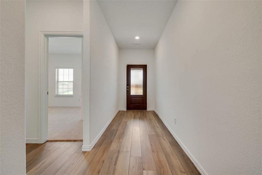 Doorway featuring hardwood / wood-style flooring