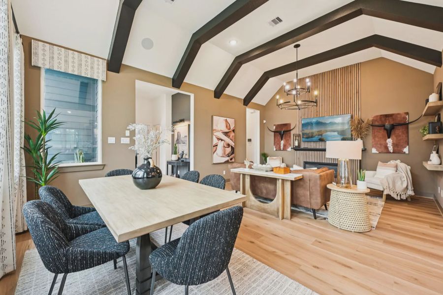 Representative furnished interior of a home built from the Tanlay by Chesmar Homes in The Woodland Hills Chateau, Willis (Image 6).