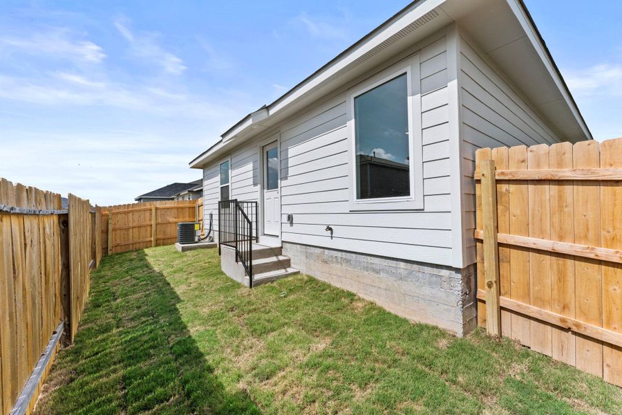 Exterior details and patio area of a home in Sunset Oaks, Maxwell (Image 2). Exterior details and patio area of a home in Sunset Oaks, Maxwell (Image 2).