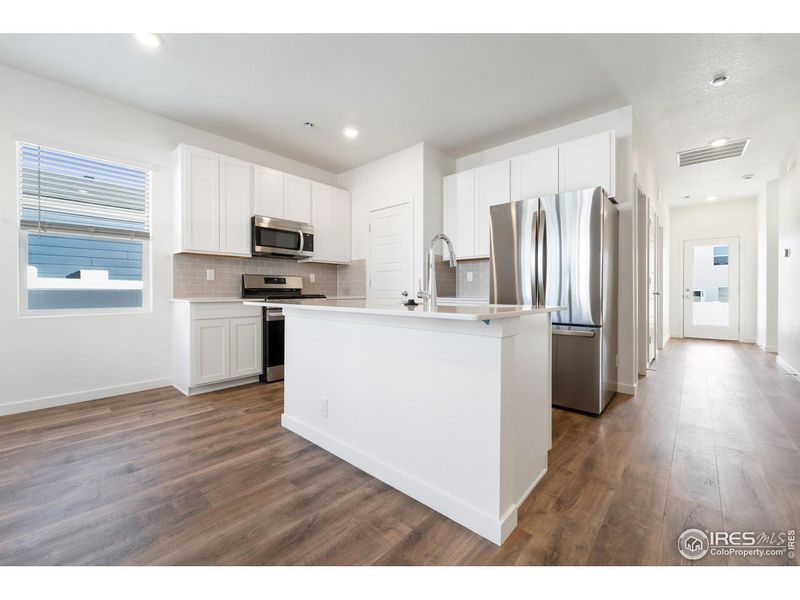 Furnished interior view inside a new home in Liberty Draw, Evans (Image 7).