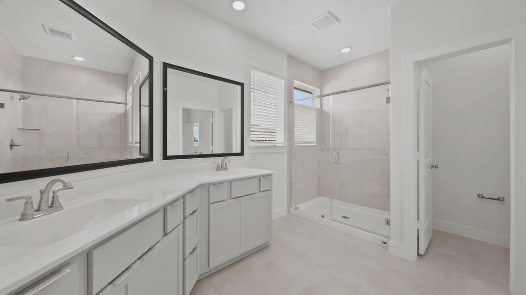 Representative furnished interior of a home built from the Rosewood by Chesmar Homes in Sienna Courtyard, Missouri City (Image 5).