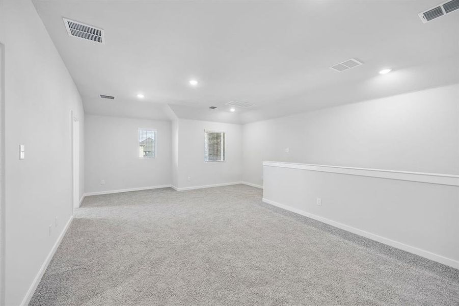 Game Room in the Mesquite home plan by Trophy Signature Homes – REPRESENTATIVE PHOTO