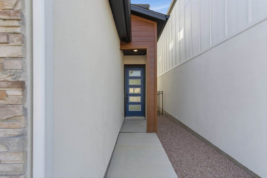 Exterior details and patio area of a home in Centero at Stone Oak, San Antonio (Image 3).