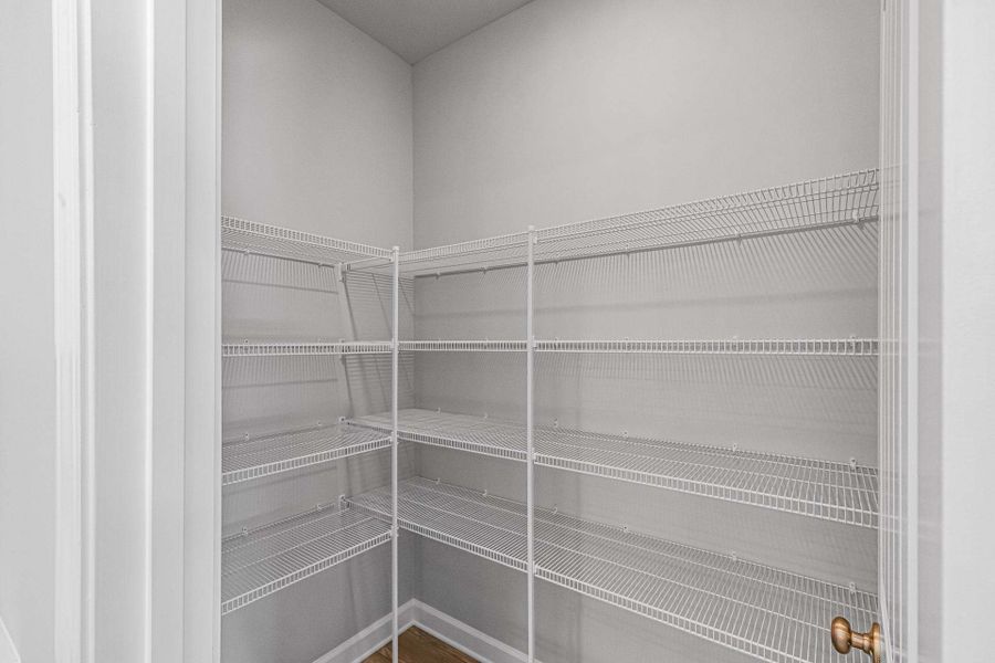 Representative furnished interior of a home built from the Weymouth by Caviness & Cates Communities in Bartlett Manor, Youngsville (Image 132).