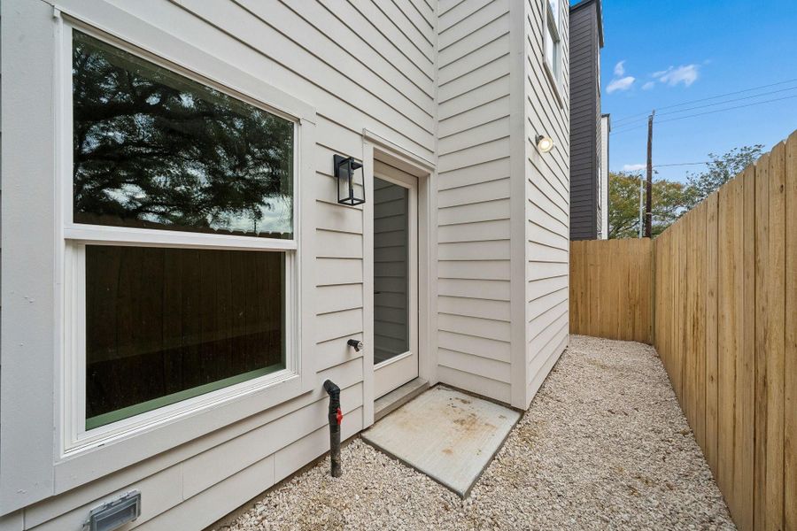 Exterior details and patio area of a home in , Houston (Image 22).