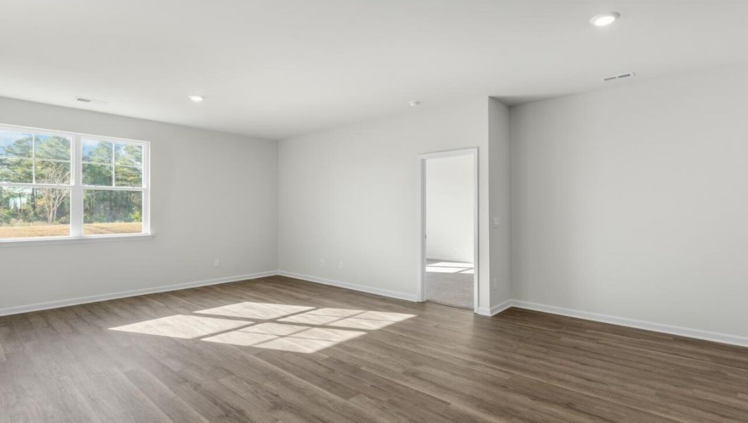 Representative unfurnished interior of a home built from the KERRY by D.R. Horton in Cedar Hill Landing, Navassa (Image 13).