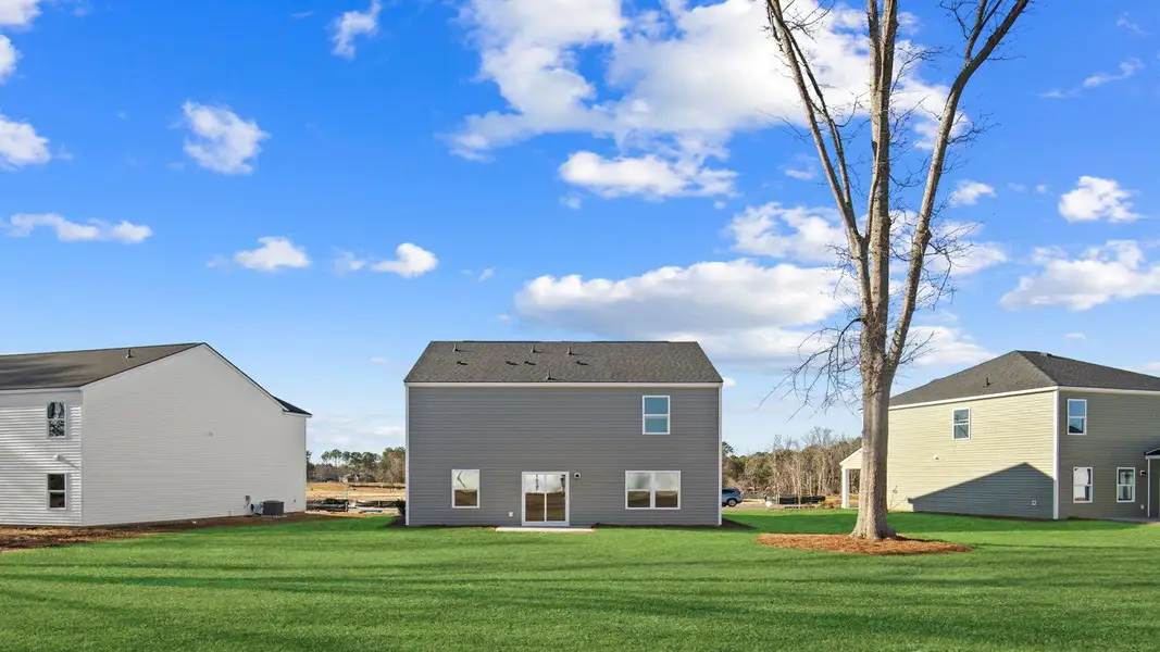 Exterior details and patio area of a home in Cypress Landing, Hardeeville (Image 2).
