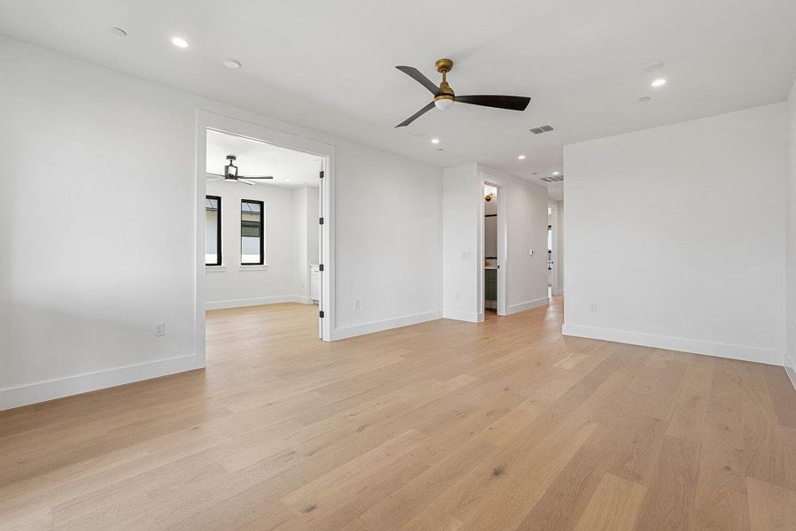 Spacious, unfurnished interior of a new home in Milky Way at River Place, Austin (Image 29).