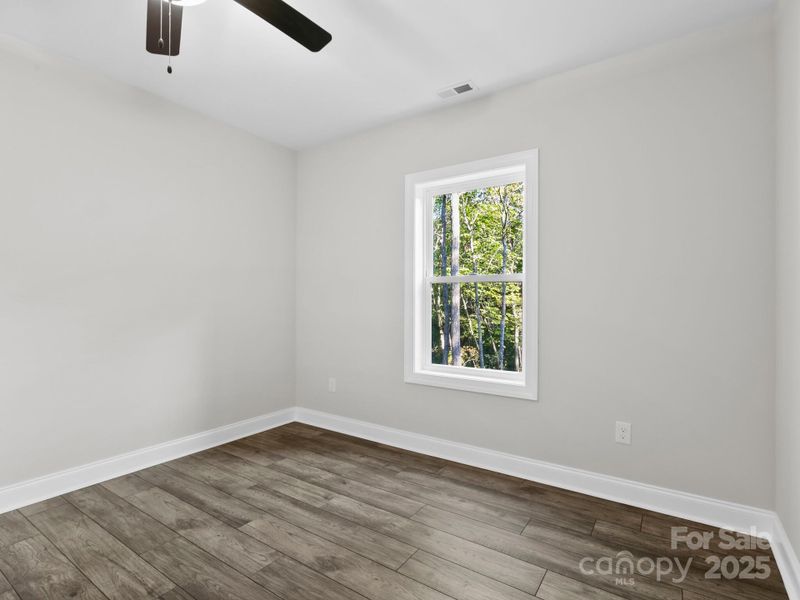 Spacious, unfurnished interior of a new home in , Black Mountain (Image 20).