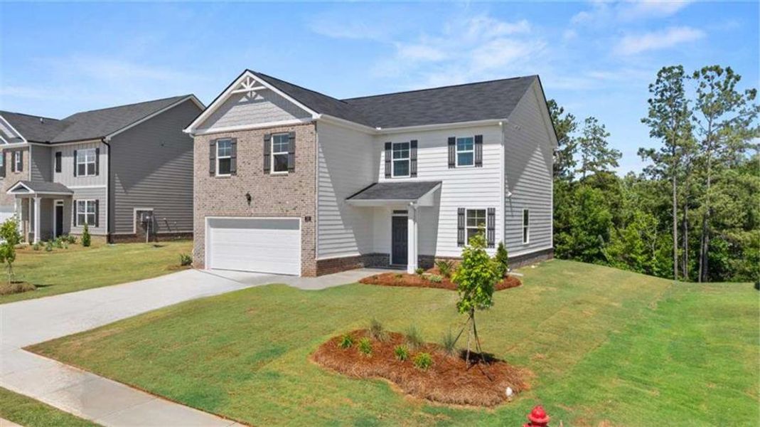 Front exterior of a new home in Poplar Preserve, Newnan, GA, highlighting curb appeal (Image 15).