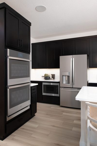 Representative furnished interior of a home built from the Victoria by Tri Pointe Homes in Painted Tree, McKinney (Image 17).