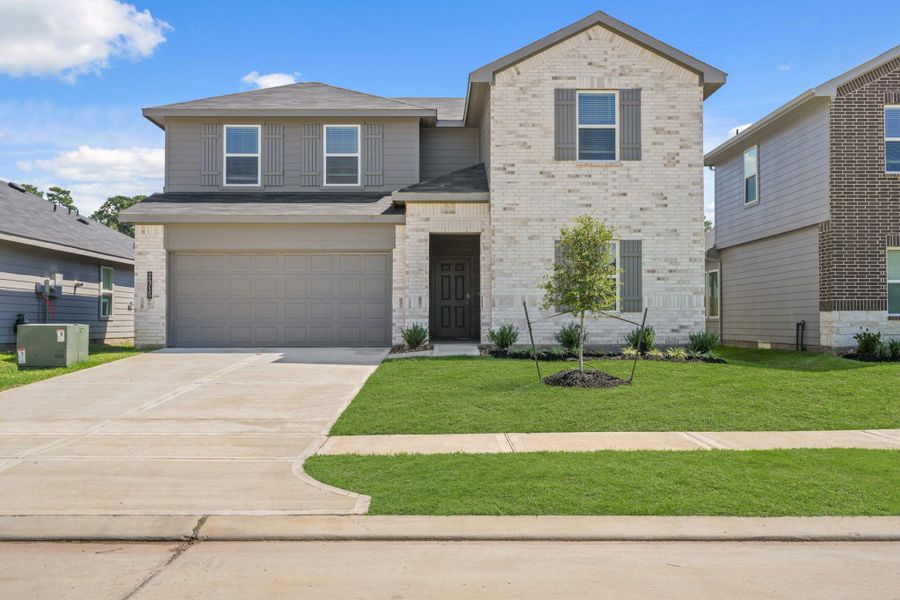 Exterior details and patio area of a home in Grand Pines, Magnolia (Image 2). Exterior details and patio area of a home in Grand Pines, Magnolia (Image 2).