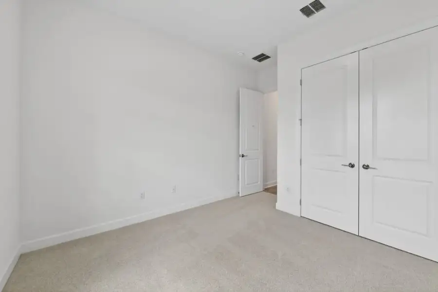 Representative unfurnished interior of a home built from the Sereno by Taylor Morrison in Esplanade at Pinewalk, St. Johns (Image 11).