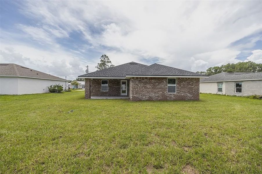 Exterior details and patio area of a home in Palm Coast, Palm Coast (Image 3).