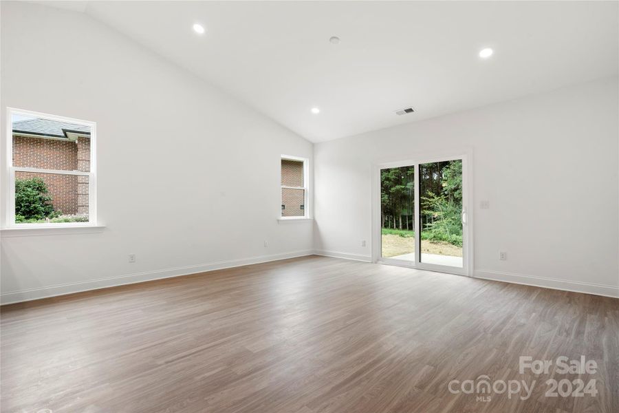 Living room with vaulted ceiling