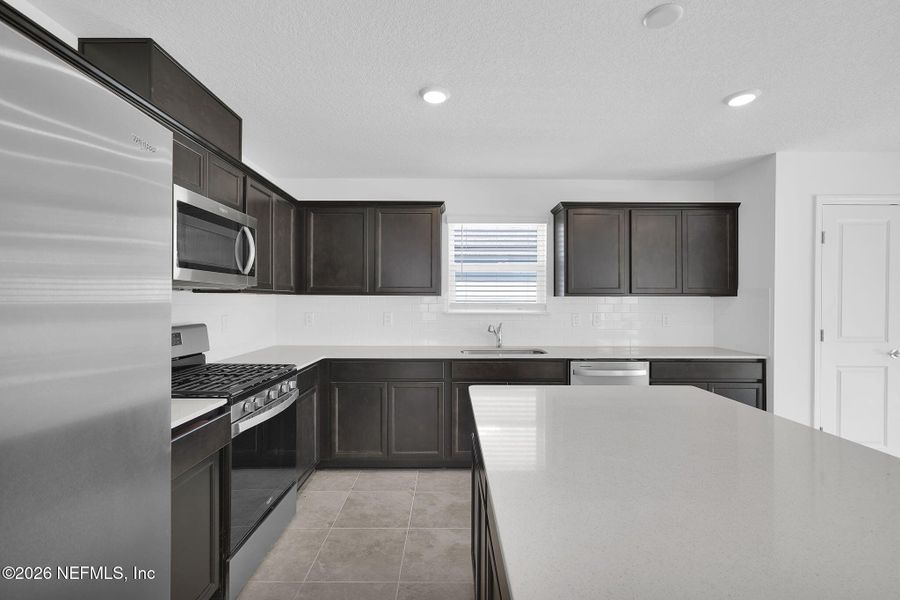 Furnished interior view inside a new home in Wells Landing, Jacksonville (Image 9).