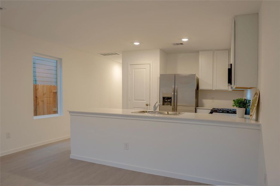 Furnished interior view inside a new home in Tavola, New Caney (Image 6).