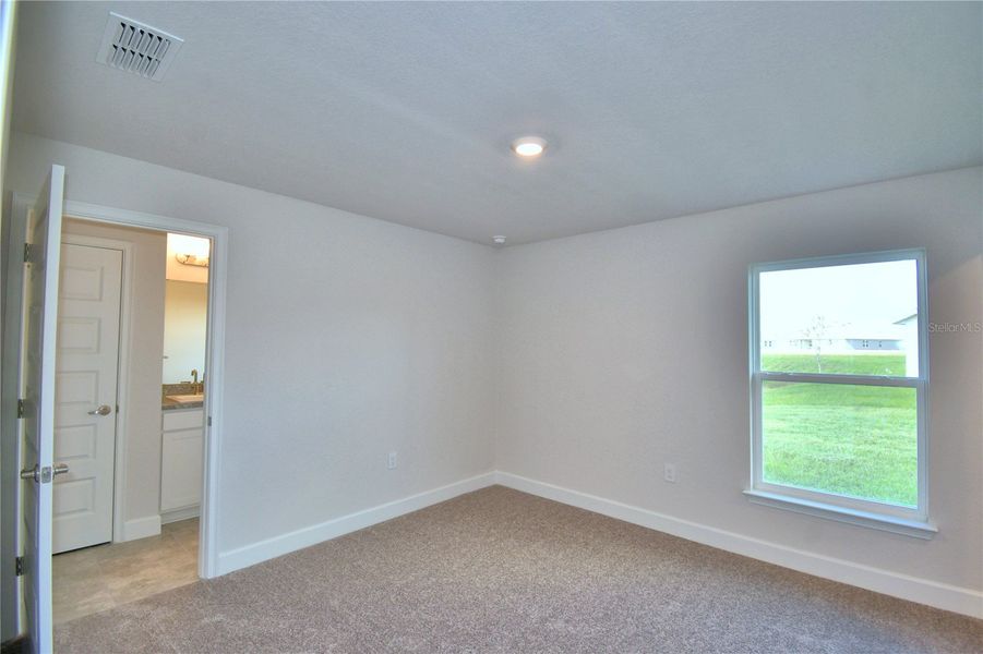 Spacious, unfurnished interior of a new home in Cadence Crossing, Auburndale (Image 32).