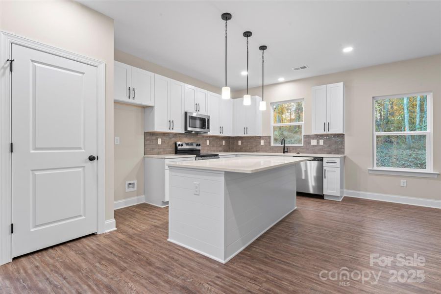 Furnished interior view inside a new home in , Charlotte (Image 8). Furnished interior view inside a new home in , Charlotte (Image 8).