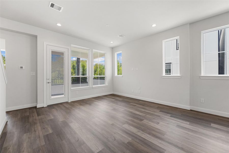 Spacious, unfurnished interior of a new home in The Corner At Buffalo Pointe, Houston (Image 21).