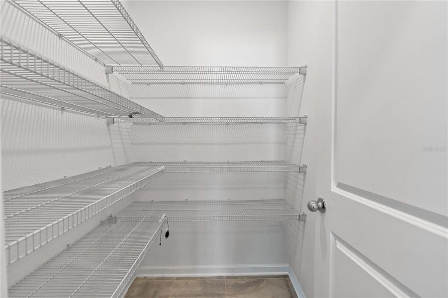 Spacious, unfurnished interior of a new home in Storey Creek: Manor Collection, Kissimmee (Image 25).