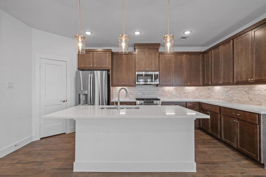 Furnished interior view inside a new home in Meridiana, Manvel (Image 7).