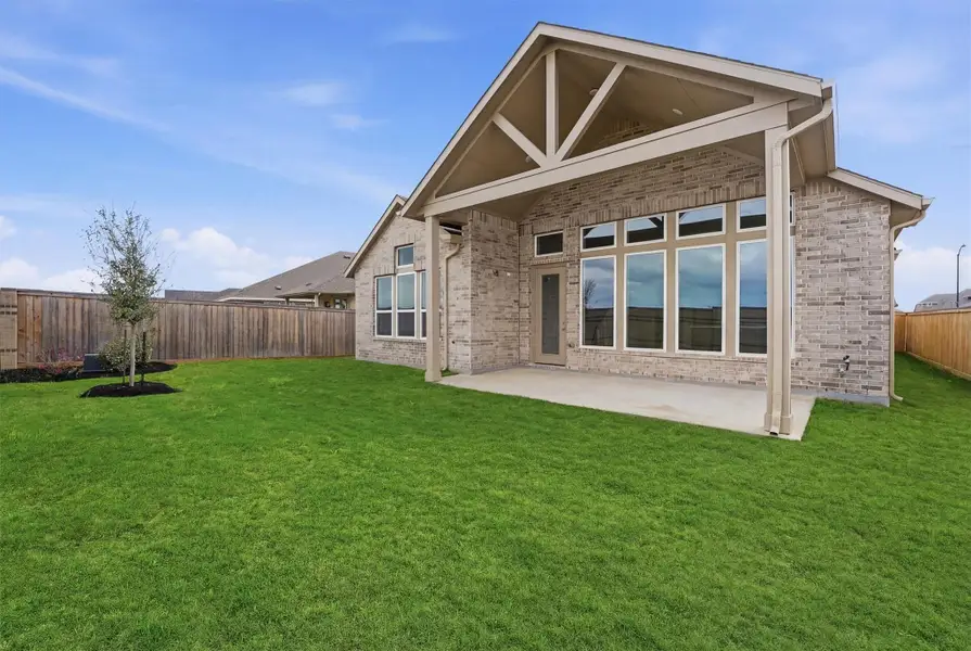Exterior details and patio area of a home in Bridgeland, Cypress (Image 2).