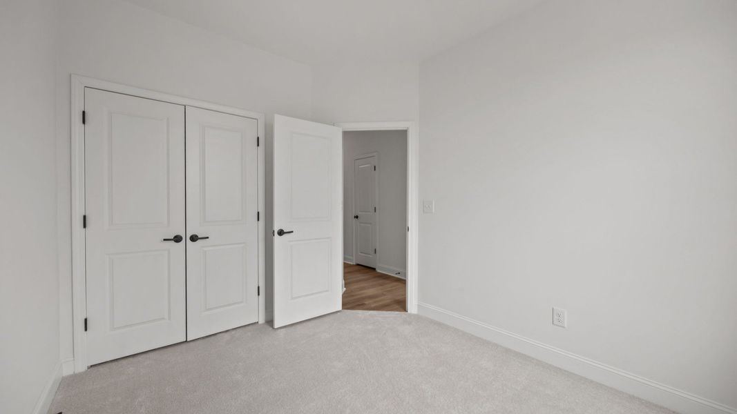 The Landon Plan in River District by DRB Homes in Charlotte NC - Secondary Bedroom The Landon Plan in River District by DRB Homes in Charlotte NC - Secondary Bedroom