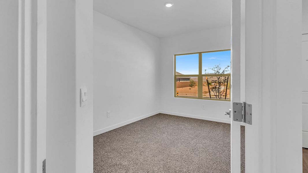 Representative unfurnished interior of a home built from the Parker by D.R. Horton in The Oasis at Rocking K, Vail (Image 16).