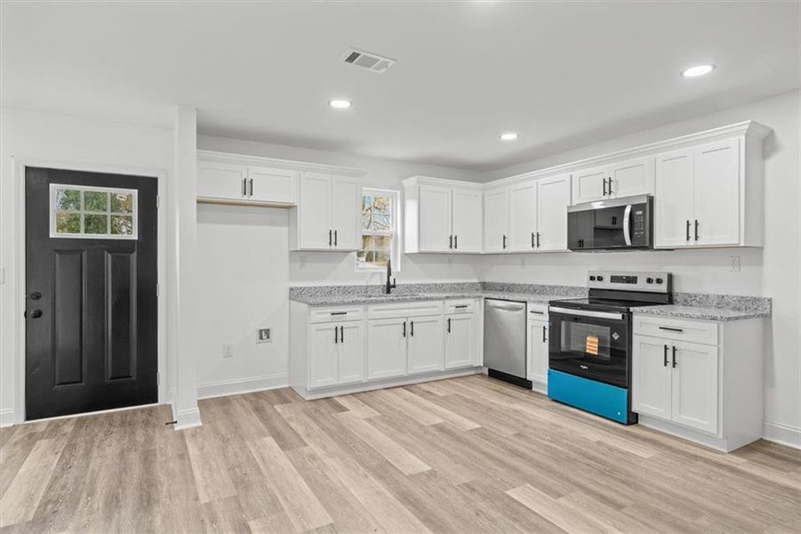 Furnished interior view inside a new home in , Calhoun (Image 6).