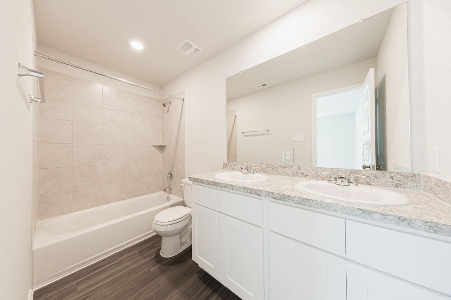Furnished interior view inside a new home in Townsend Reserve, Splendora (Image 6).