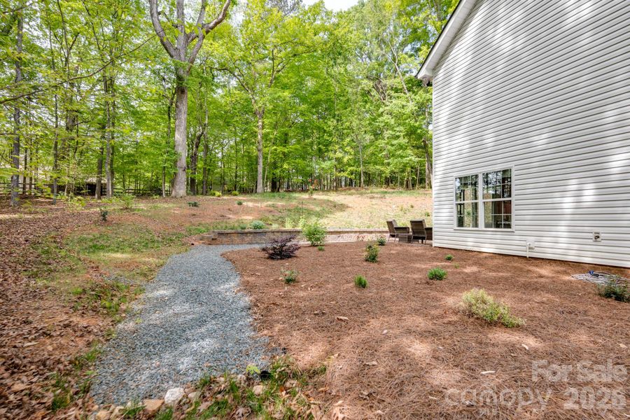 Exterior details and patio area of a home in , Waxhaw (Image 24).