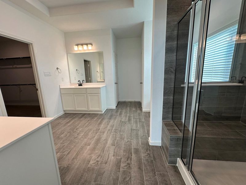 Furnished interior view inside a new home in , Iowa Colony (Image 10).