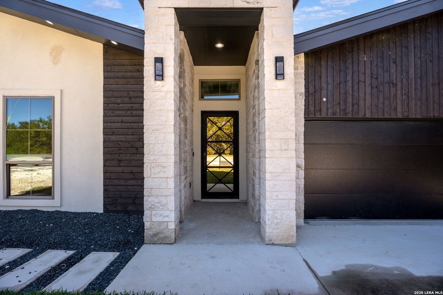 Exterior details and patio area of a home in , Spring Branch (Image 24). Exterior details and patio area of a home in , Spring Branch (Image 24).