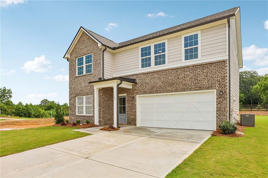 Front exterior of a new home in Langston Reserve, Cartersville, GA, highlighting curb appeal (Image 1). Front exterior of a new home in Langston Reserve, Cartersville, GA, highlighting curb appeal (Image 1).