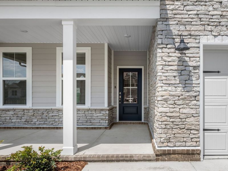 Exterior details and patio area of a home in Woods Crossing, Gallatin (Image 4).